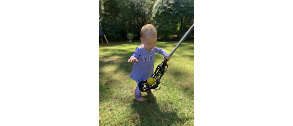 Never to young to get a stick in your hand!